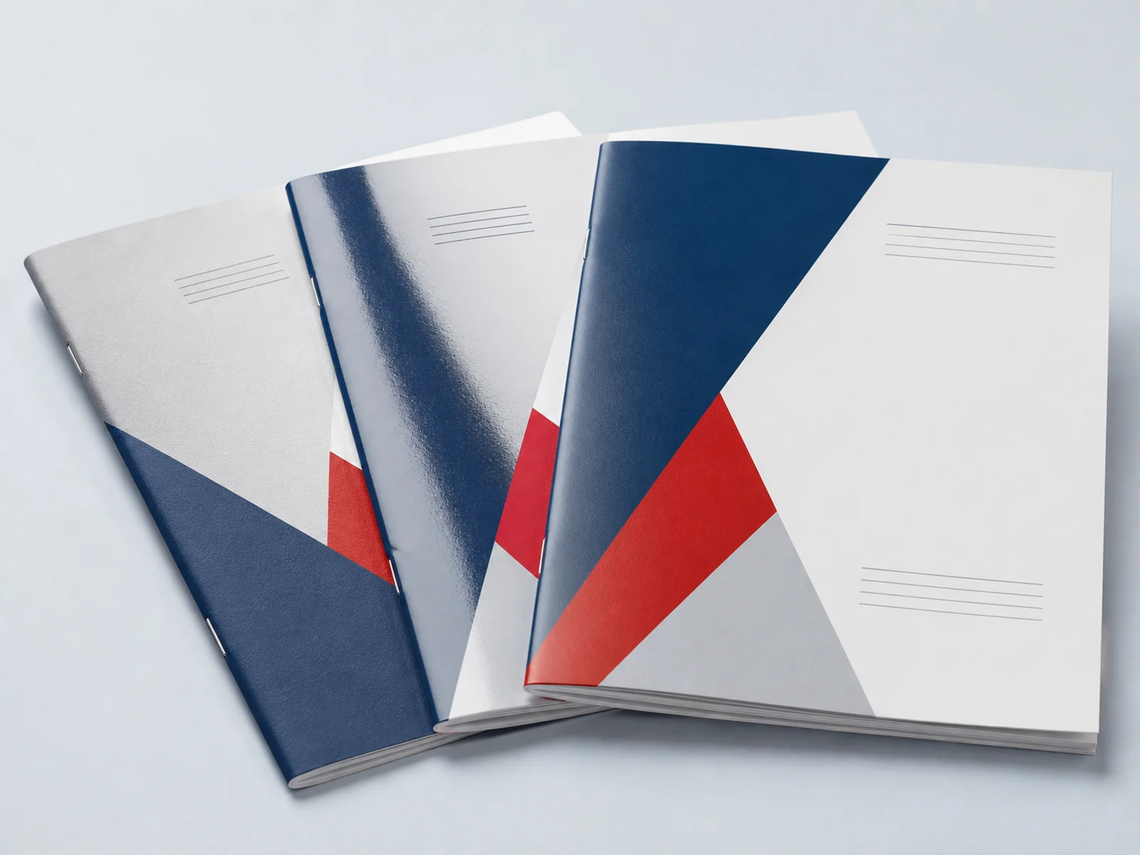 Three booklet covers in matte laminate, gloss laminate, and uncoated stock
