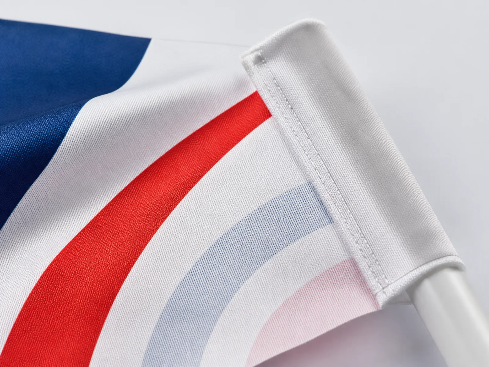 A close view of printed knit flag fabric at the stitched pole sleeve