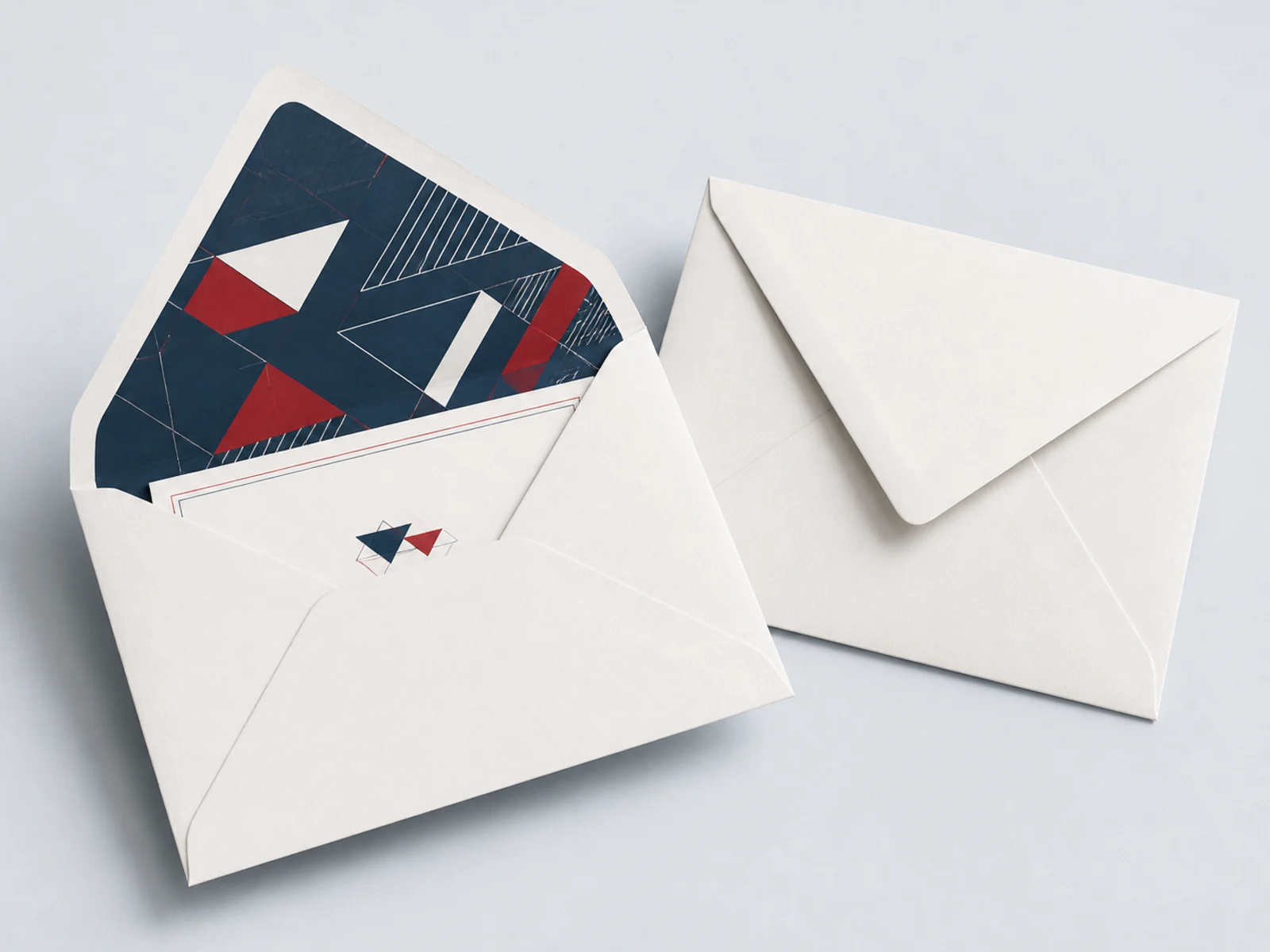 An envelope with its flap folded back to reveal a printed liner