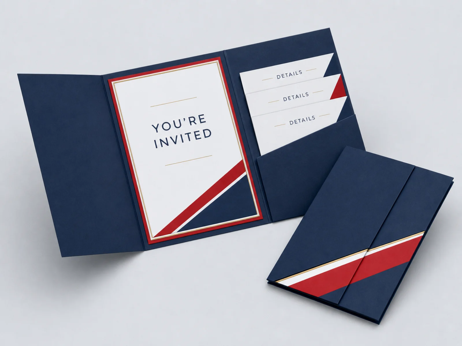 A pocket fold invitation open to show inserts seated in the pocket