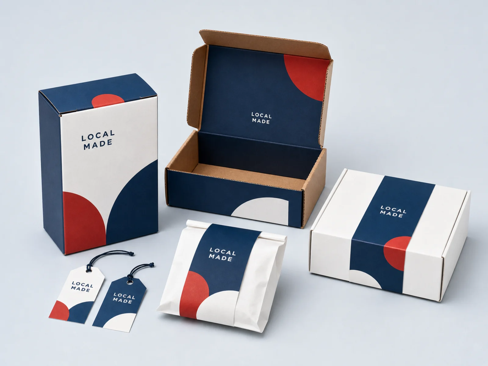 A packaging set with a carton, mailer, printed tissue, seal sticker, hang tag, and card