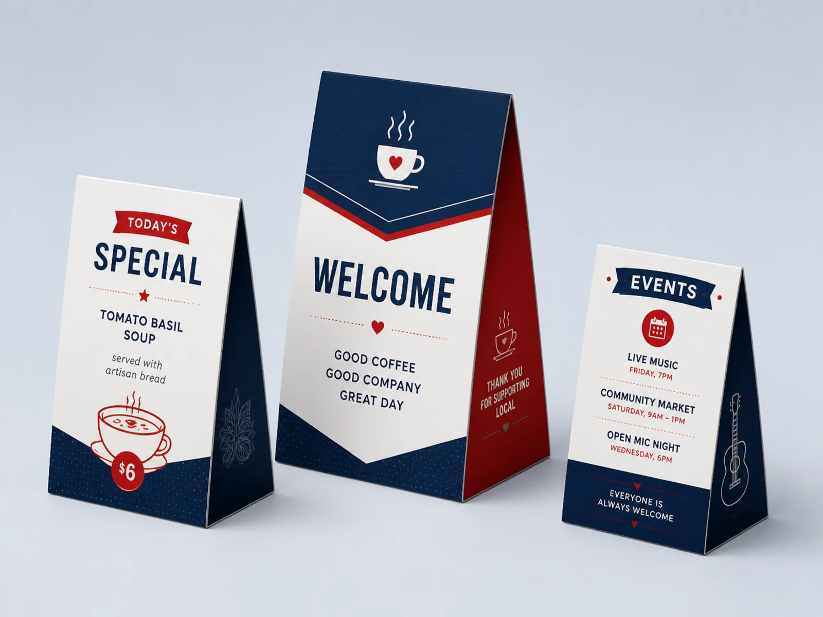 Three table tents in different sizes and folds standing on a surface
