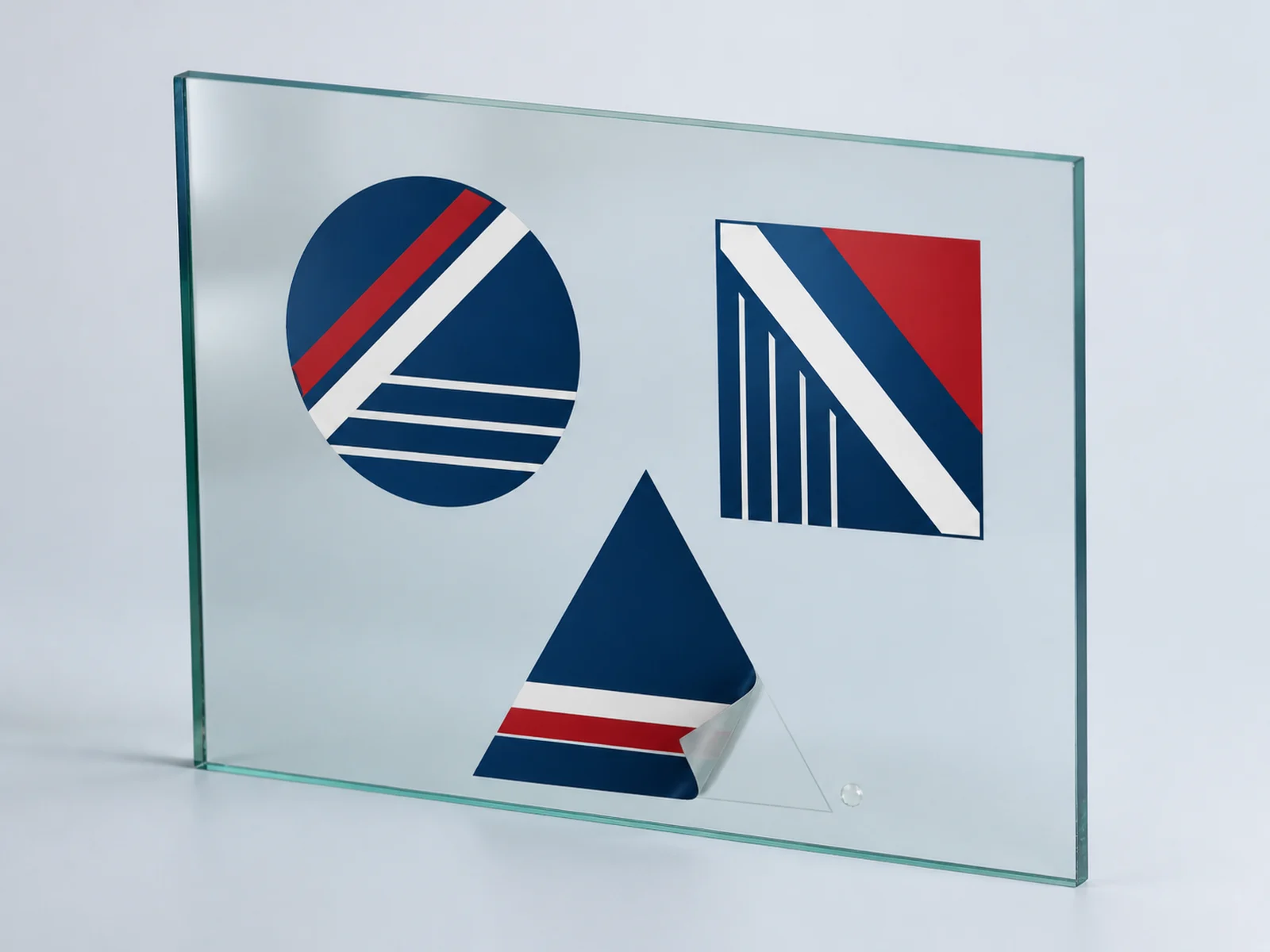 Static cling decals on glass with one peeled back at the corner