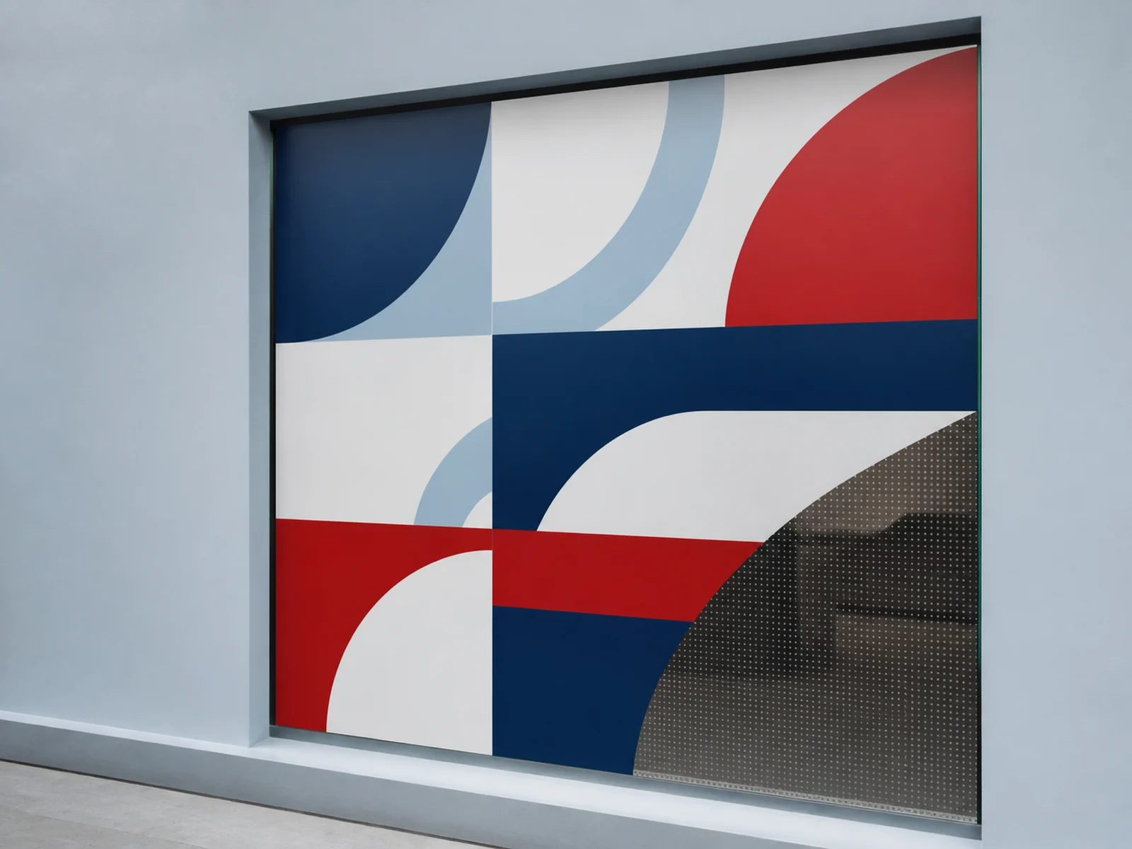 Perforated window film on a storefront pane, solid from outside and see through from inside