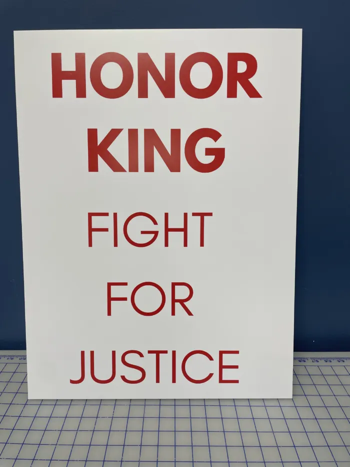 Custom foam board sign with full-color vinyl print at Signature Postal