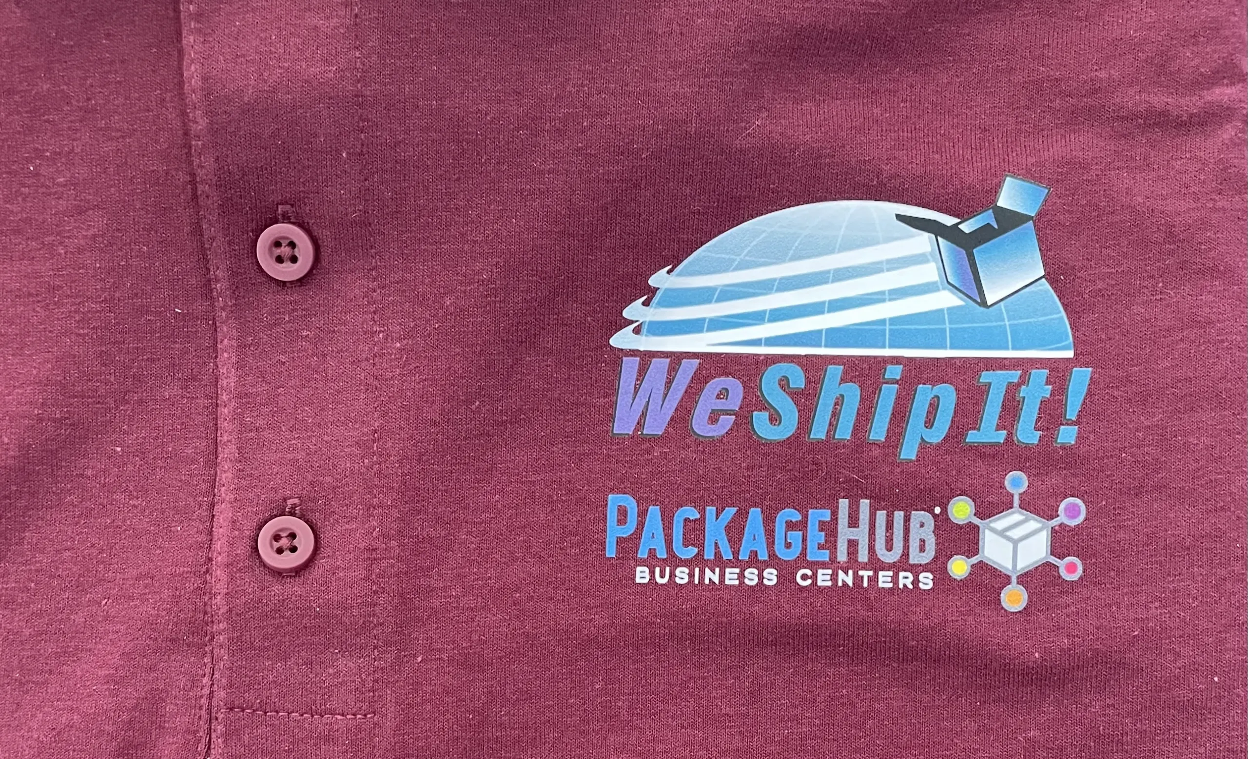 Direct to Film Heatpress Fuquay Varina A Burgundy polo shirt with a direct to film logo heat pressed on.